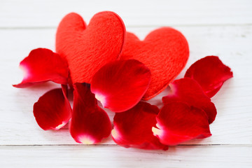Sticker - rose petals and heart on white wooden background - flower red rose petals for valentine day concept
