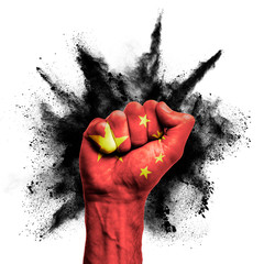 Wall Mural - China raised fist with powder explosion, power, protest concept