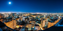 Panorama Skyview Of Porto Alegre City During The Night With Airplane Trail In The Sky, Rio Grande Do Sul, Brazil