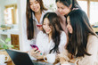 © themorningglory - Business women team discussion together with laptop com[puter in home office