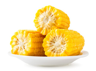 Wall Mural - Boiled corn slices close-up on a white background in a plate slide. Isolated