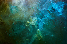 Green Blue Abstract Exoplanet Outer Space Vibrant Sea. Waves, Splashes And Drops Of Water Paint. Mysterious Esoteric Depths Of The Galactic Ocean