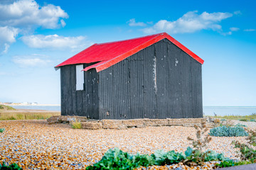 Sticker - Famous black shed with red roof on Rye Nature Reserve.