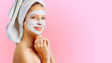Wall Mural - cosmetology, skin care, face treatment, spa and natural beauty concept. woman with facial mask.