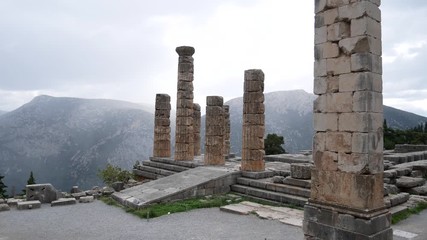 Wall Mural - Ruins of the ancient temple of Apollo, archaeological site of Delphi along the slope of Mount Parnassus, UNESCO World Heritage, Greece.