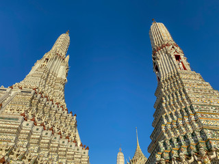 Wat Arun against a beautiful blue sky, Bangkok