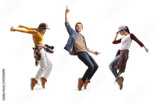 Photographie Three young dancers dancing street-dance