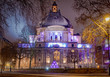 Purple lights and government building at Parliament Square on a cold London night evening
