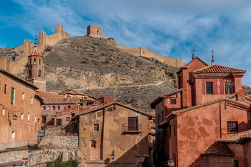 Wall Mural - Aerial panorama view of Albarracin in Teruel Spain, with red sandstone terracotta medieval houses, Moorish castle and ancient city walls  voted most beautiful Spanish village