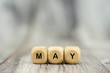 © Konstantin - The word May on wooden cubes. Month of year