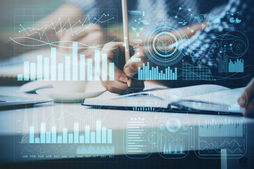 Multi exposure of two men planing investment with stock market forex chart.