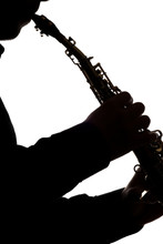 Saxafon On A White Background In The Hands Of A Musician Silhouette
