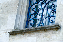 Closeup Architectural Details Of Ancient Historic Castle Or Chateau In France - Windows With Anti Bird Spikes
