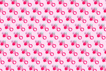 Toy Rattle Pattern On Pink Background