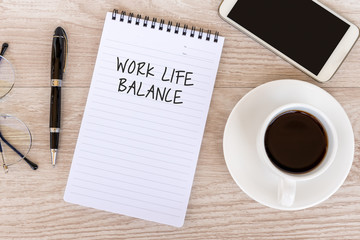 Wall Mural - Work life balance text on note pad on top of wood desk