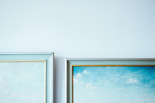 Cropped Image Of Paintings On Wall