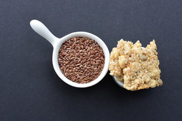  Natural sesame seeds on wooden background