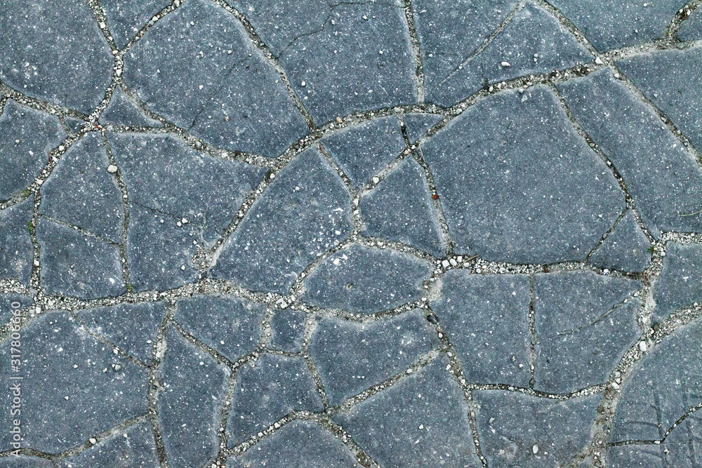 Stock-Foto „Detail of cracked asphalt pavement surface. Chapped ...