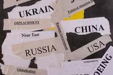 Sheets Of Paper With Words Reflecting The Political Situation In The World.