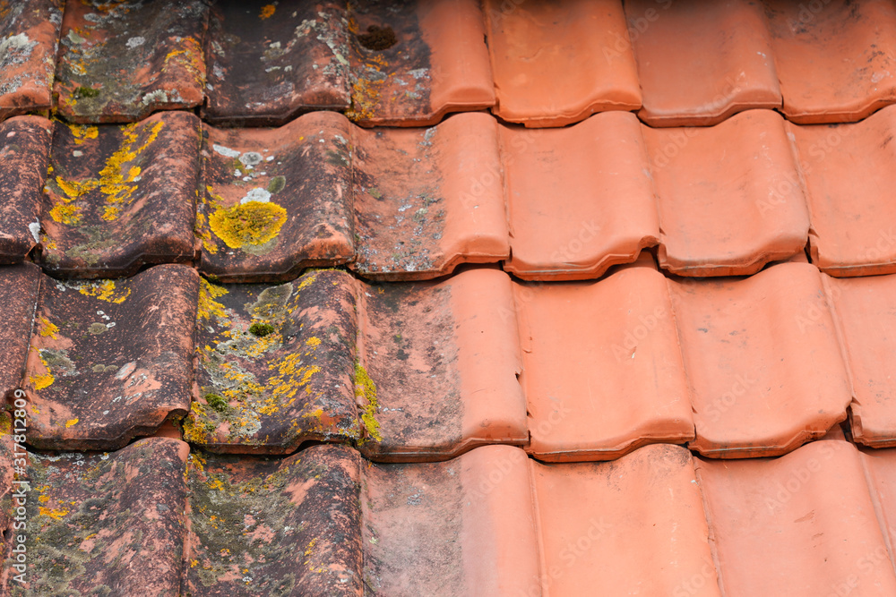 Comparison roof top before and after cleaning moss lichen high pressure water cleaner tile - obrazy, fototapety, plakaty 