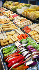 Beautiful layout snacks on display at Asian street food market