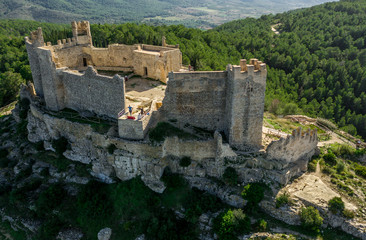 Aerial panorama view of Alcala de Xivert (Alcalá de Chivert) medieval Templar knight castle ruins in Valencia province Spain