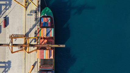 Aerial drone photo of industrial logistics commercial container terminal port in mediterranean destination