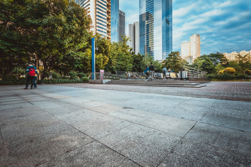 empty, modern square and skyscrapers in modern city