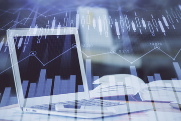 Forex graph hologram on table with computer background. Double exposure. Concept of financial markets.