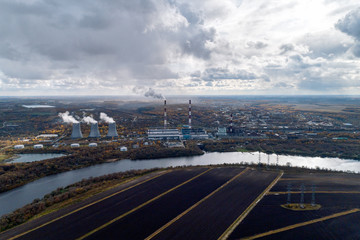 Wall Mural - Thermal power station standing on the banks of the river.