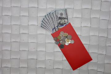 Wall Mural - Hand holding red envelope to give in chinese new year.