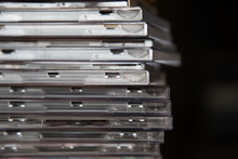 CLOSE-UP OF CDs STACK