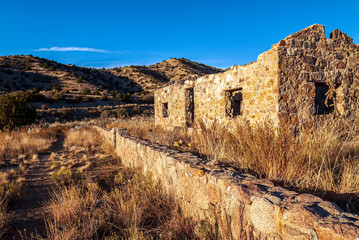 Sticker - Old Abandoned Stone House and Wall Late Afternoon