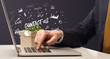 © ra2 studio - Businessman working on laptop with CONTACT US inscription, modern business concept