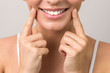 Leinwandbild Motiv closeup view of female wide cheerful smile with white teeth and clean skin