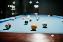  Pool Balls On A Blue Pool Table 