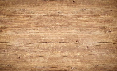 Wood texture background., vintage wooden table with cracks and knotts. Light brown surface of old wood with natural color and pattern.