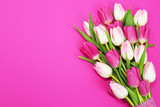 Fototapeta Tulipany - Bouquet of beautiful tulips on pink background.