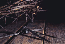 Close Up Bloody Nails And Crown Of Thorns As Symbol Of Passion, Death And Resurrection Of Jesus Christ.