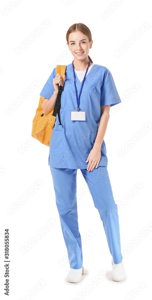 Female medical student with backpack on white background