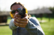 Man Shooting with Gun at Gun range