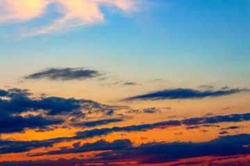 Wall Mural - orange sunset sky with clouds. beautiful nature background
