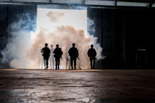 Silhouette Army Soldiers Walking By Tear Gas Walking On Floor