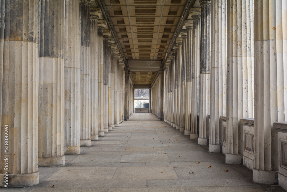 Row of classic greek columns in Berlin, Germany - obrazy, fototapety, plakaty 