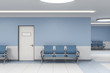 Modern waiting room in blue medical office interior
