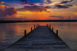 Fototapeta  - wooden pier at sunset