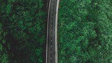 High Angle View Of Road Amidst Trees In Forest