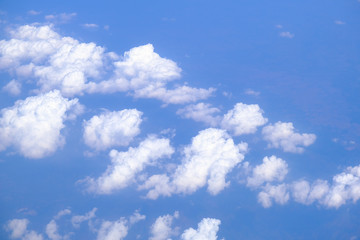 Nature background of blue sky with fluffy cloud above view