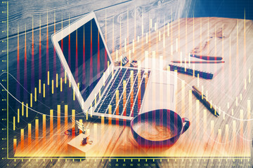 Multi exposure of graph and financial info and work space with computer background. Concept of international online trading.