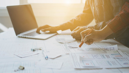 Designers man drawing (UX) (UI) Graphic designer creative sketch planning application process development prototype for responsive web desig